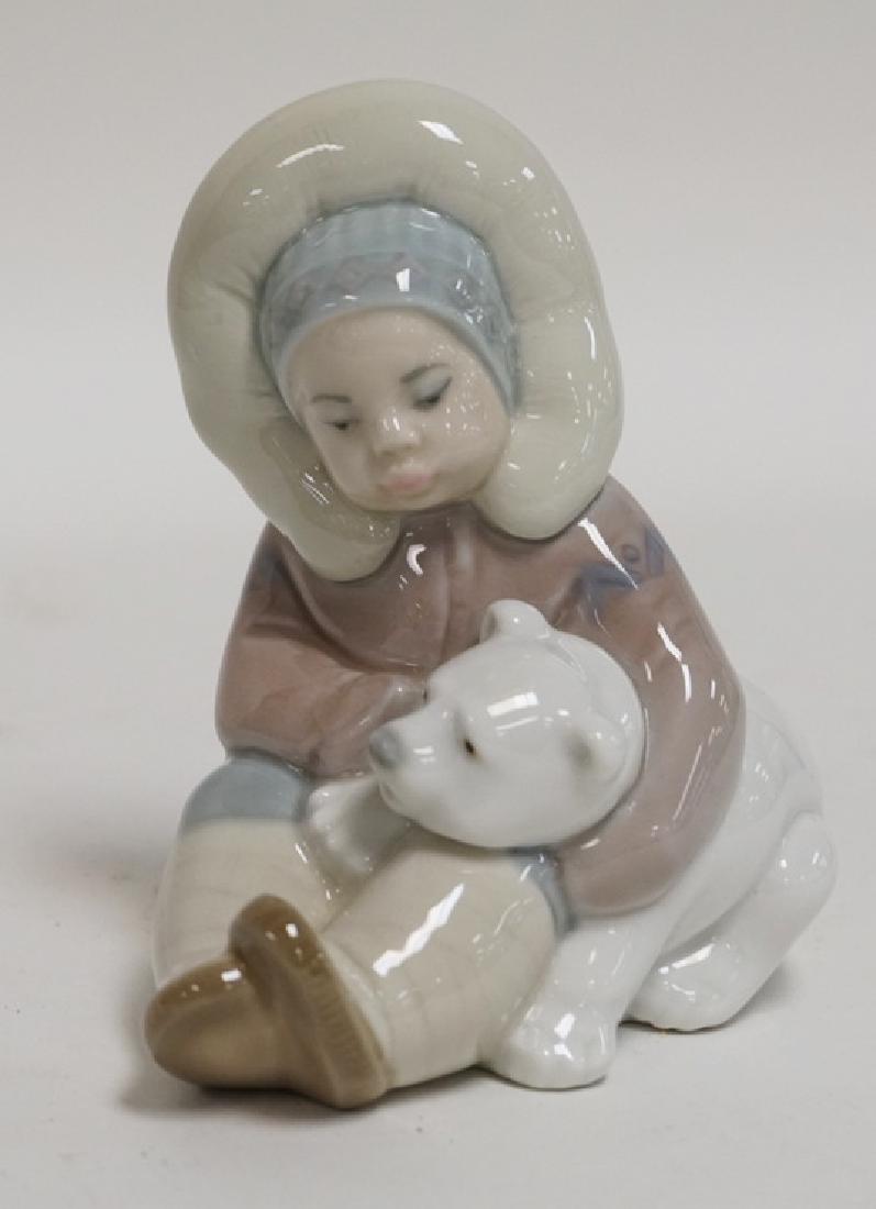 LLADRO PORCELAIN FIGURE OF AN ESKIMO CHILD HOLDING A (1 of 1)