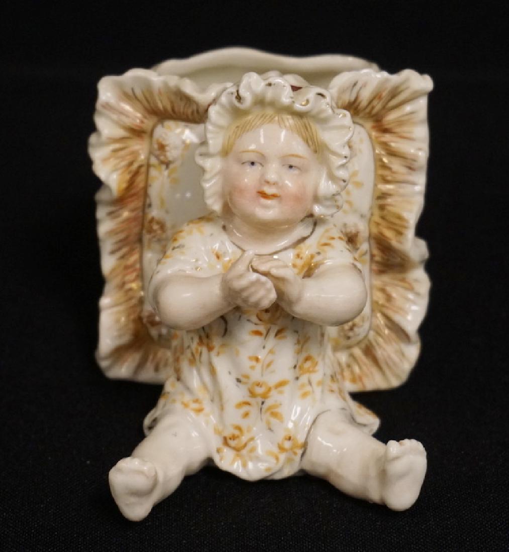 FIGURAL GERMAN PORCELAIN TOOTHPICK HOLDER. HAND: FIGURAL GERMAN PORCELAIN TOOTHPICK HOLDER. HAND PAINTED. 3 INCHES HIGH.