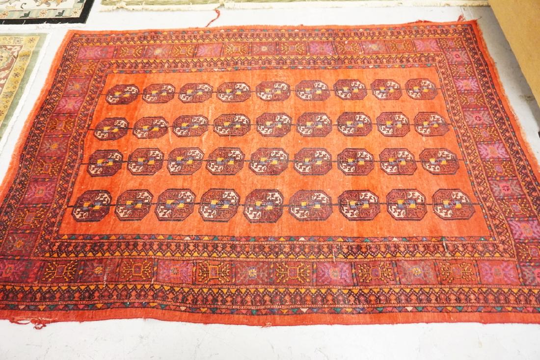 RED BOKHARA RUG. SOME EDGE FRAYING. 8 FT 6 IN X 5 FT 8 (1 of 1)