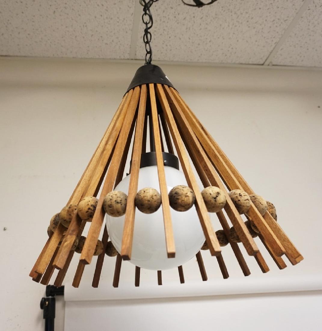 MODERN HANGING LIGHT WITH WOOD FRAME AND CORK SPACERS. (1 of 2)