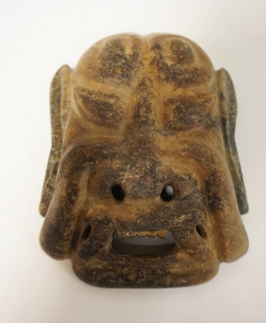 ASIAN CARVED STONE MASK. 8 1/2 X 6 1/4 INCHES. (1 of 1)
