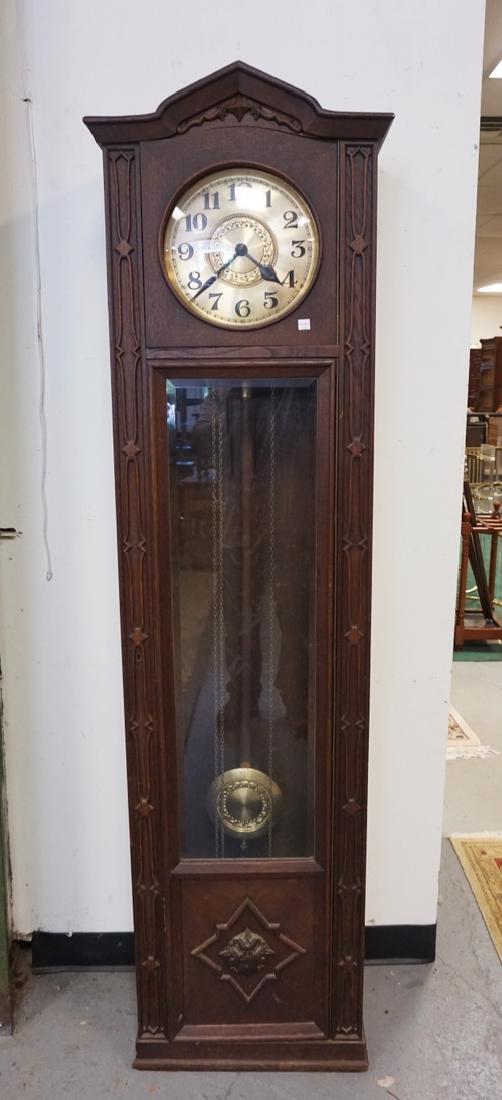 TALL CASE CLOCK IN CARVED OAK CASE. BRASS FACE. 74 3/4 (1 of 2)