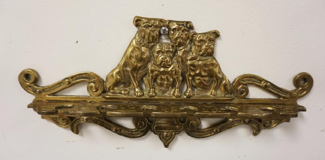 FIGURAL BRASS PIPE RACK WITH BULLDOGS AS A CREST. 12 (1 of 2)