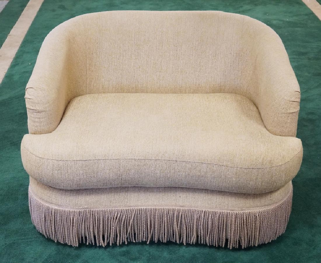 THOMAS ALEXANDER CREAM COLORED SWIVEL CHAIR AND A HALF. (1 of 2)