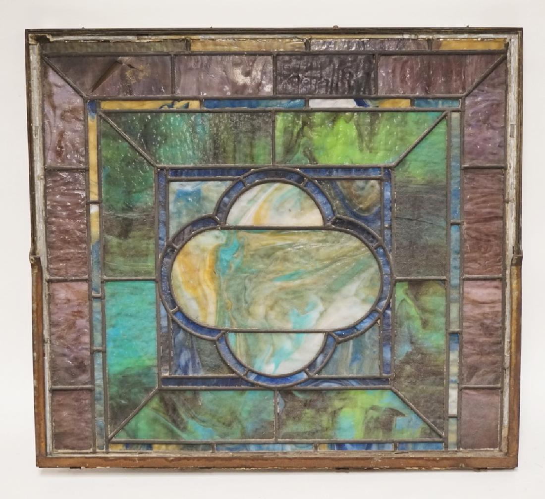 LEADED GLASS WINDOW MEASURING 28 1/2 X 25 1/2 INCHES.: LEADED GLASS WINDOW MEASURING 28 1/2 X 25 1/2 INCHES. ONE DAMAGED PANEL.