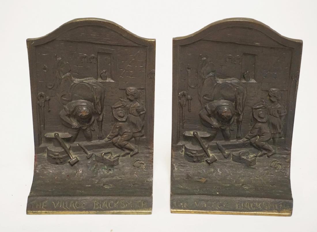 PAIR OF BRONZE *VILLAGE BLACKSMITH* BOOKENDS. 5 INCHES (1 of 1)