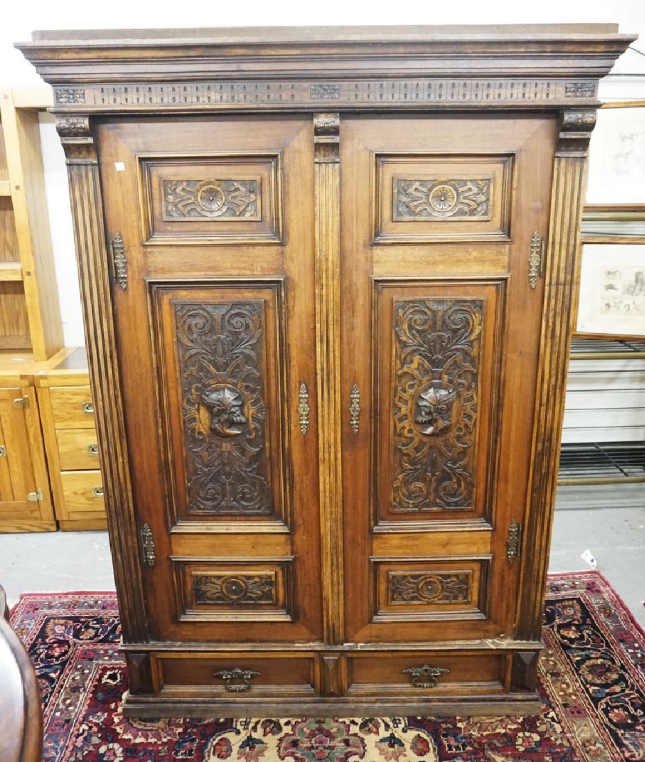 ANTIQUE CARVED WALNUT ARMOIRE. CARVED PANELS INCLUDING (1 of 4)
