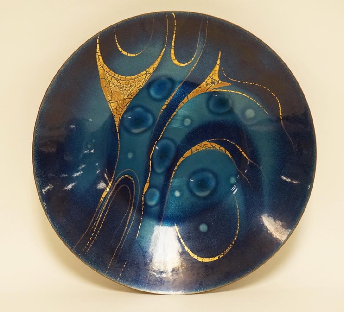 SASCHA BRASTOFF ENAMEL ON COPPER BOWL IN COBALT BLUE: SASCHA BRASTOFF ENAMEL ON COPPER BOWL IN COBALT BLUE AND GOLD. SIGNED *SASCHA B*. 11 3/8 INCHES IN DIA. 1 3/4 INCHES DEEP.