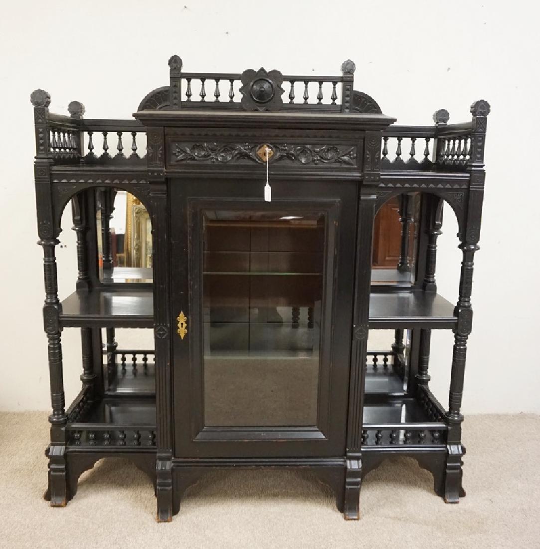 EBONIZED VICTORIAN ETEGERE HAVING EXCEPTIONALLY CARVED: EBONIZED VICTORIAN ETEGERE HAVING EXCEPTIONALLY CARVED AND TURNED EMBELLISHMENTS. 50 INCHES WIDE. 54 1/4 INCHES HIGH.