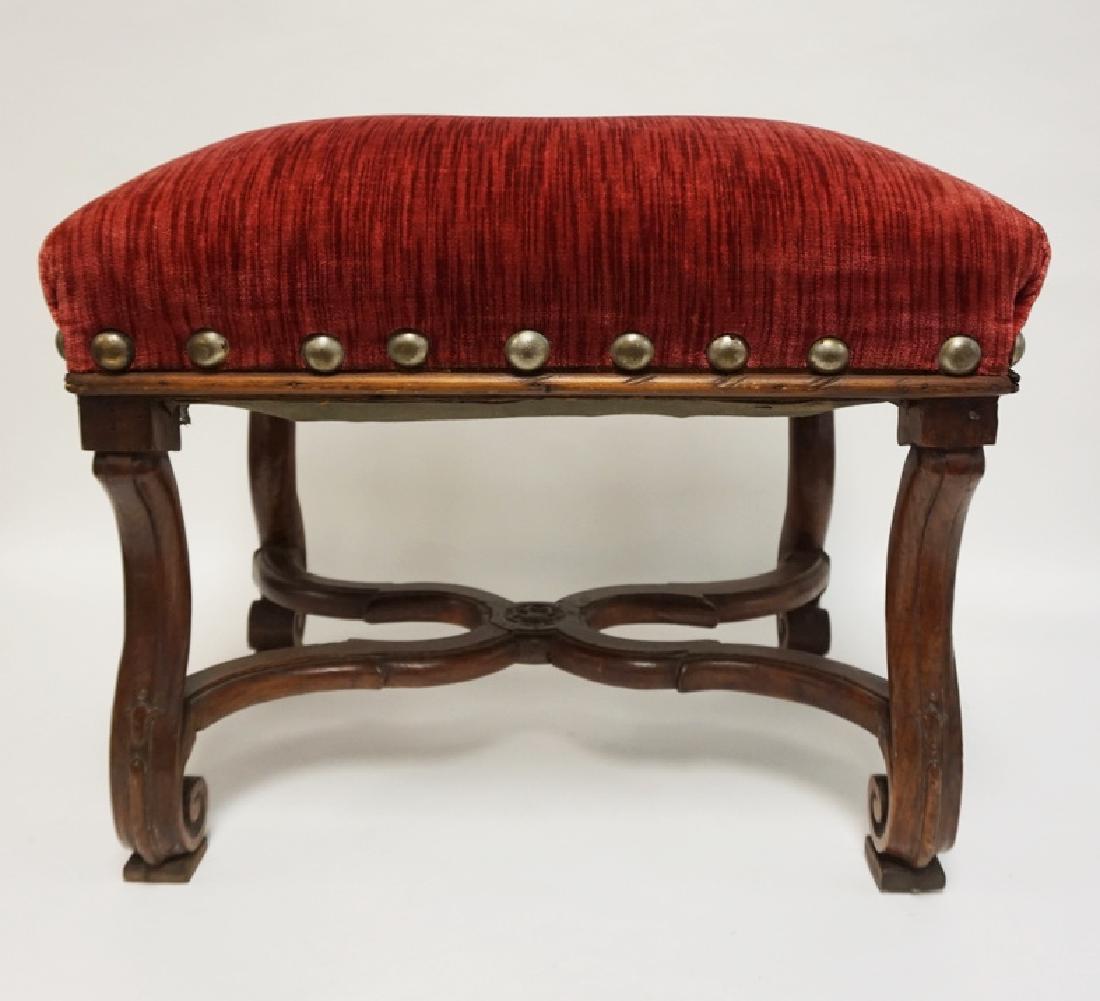 CARVED WALNUT FOOTSTOOL WITH AN UPHOLSTERED TOP. (1 of 2)