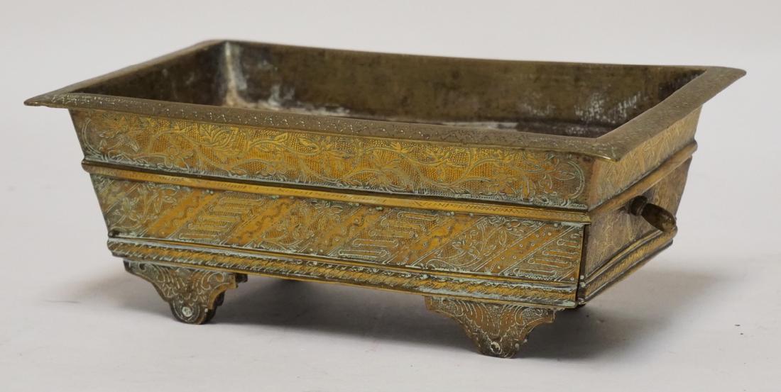 ANTIQUE ASIAN BRASS CASKET WIN ONE DRAWER. 2 WHEELS: ANTIQUE ASIAN BRASS CASKET WIN ONE DRAWER. 2 WHEELS MISSING ON BASE, ORNATELY TOOLED. 8 3/4 X 5 3/8 AND 3 1/4 INCHES HIGH.