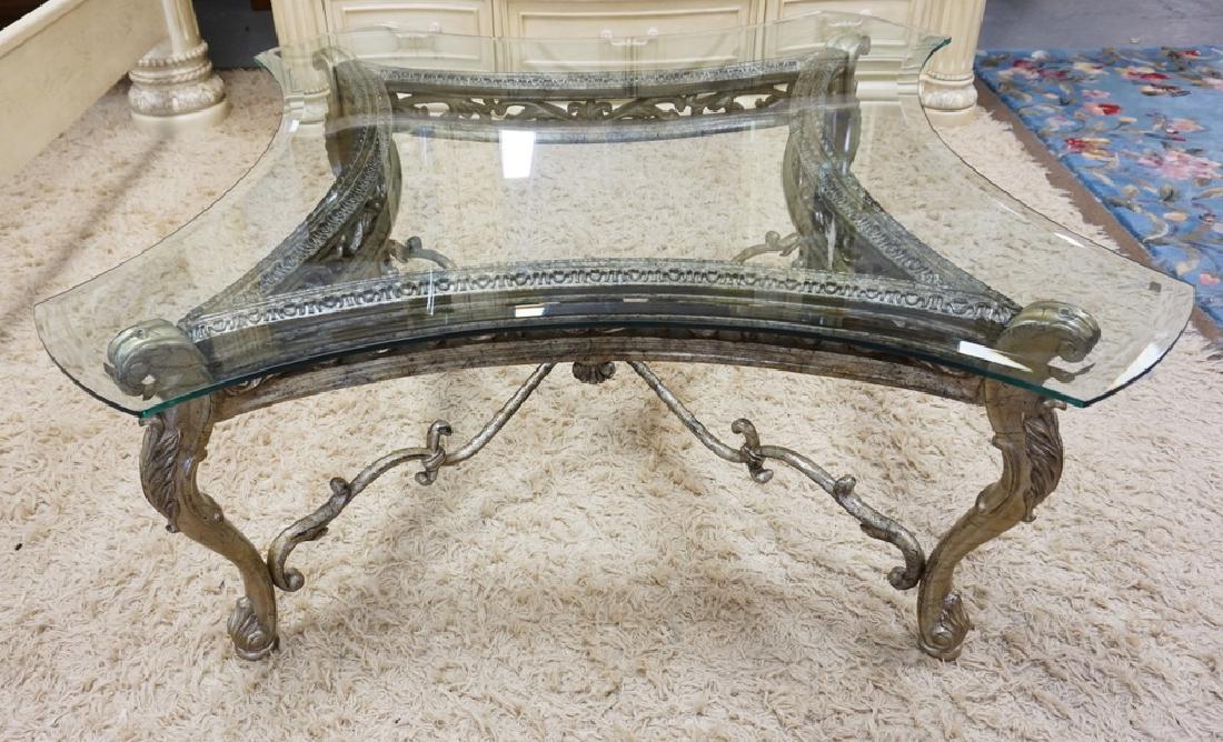 COFFEE TABLE WITH A BEVELED GLASS TOP AND AN ORNATE (1 of 2)