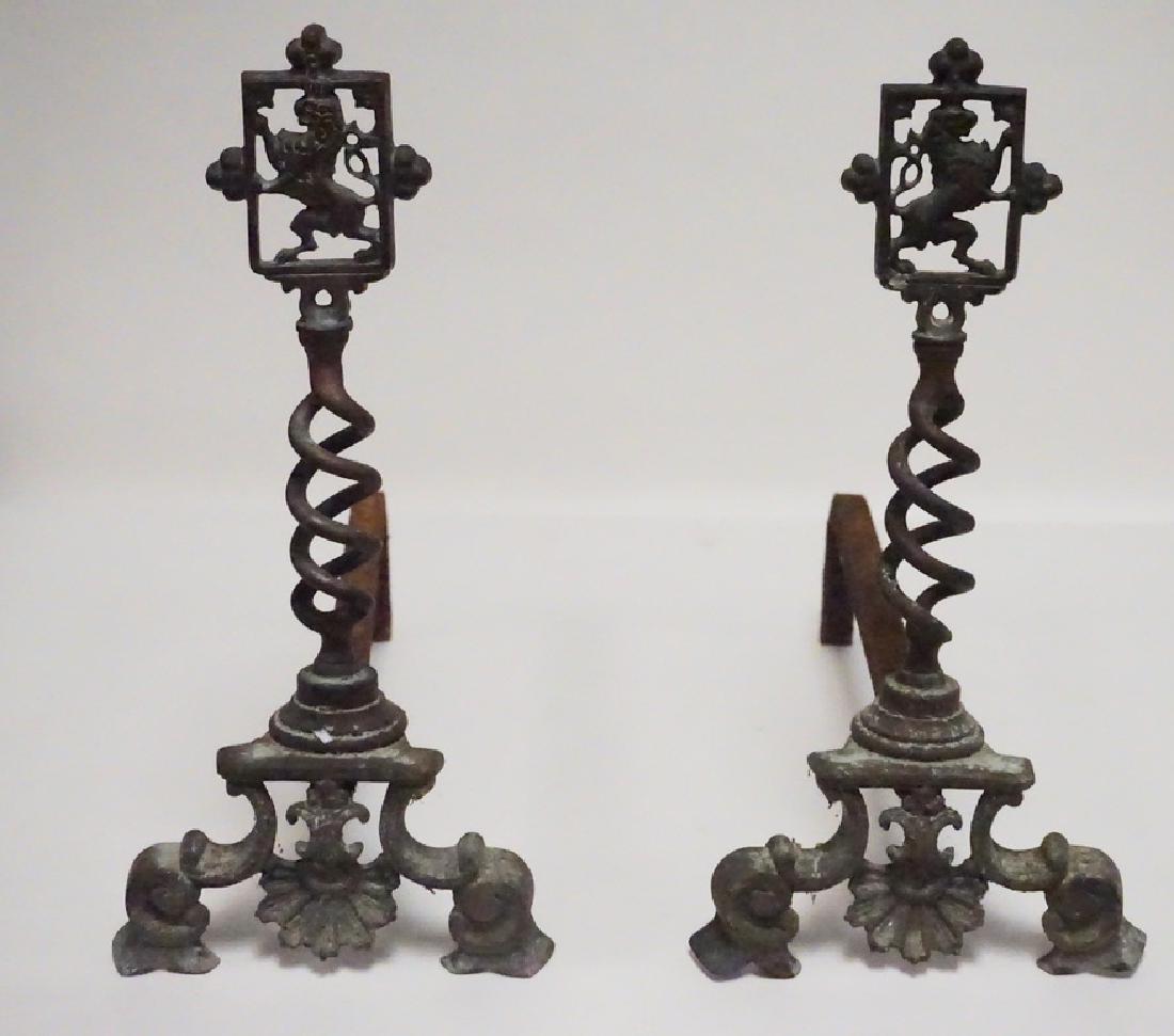PAIR OF ANTIQUE BRASS ANDIRONS WITH RAMPANT LION TOPS.: PAIR OF ANTIQUE BRASS ANDIRONS WITH RAMPANT LION TOPS. 16 1/2 INCHES HIGH.