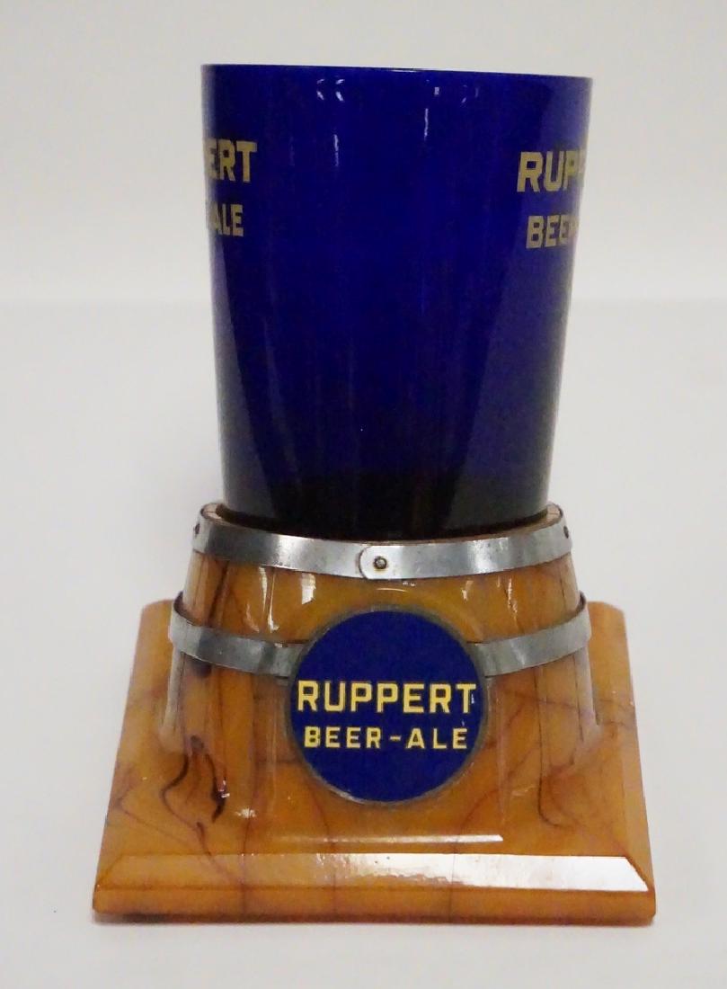 RUPPERT ALE ADVERTISING GLASS AND BARREL FORM STAND. (1 of 2)