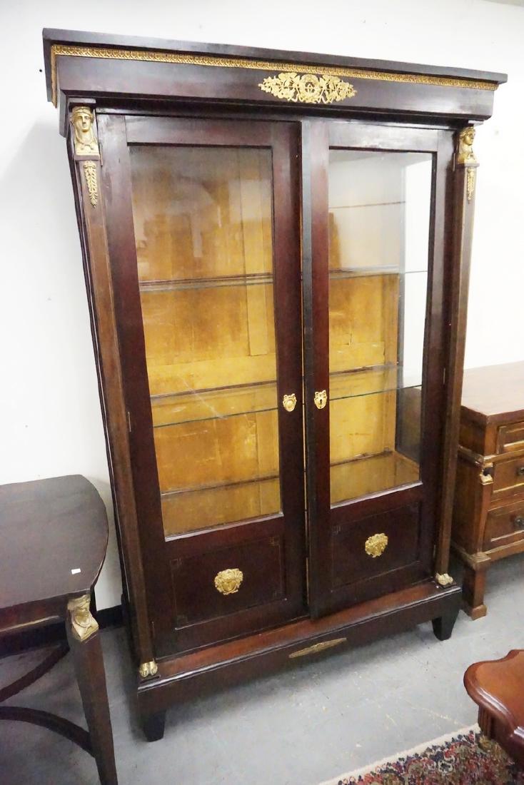ANTIQUE EMPIRE MAHOGANY CHINA CABINET WITH GILT BRONZE: ANTIQUE EMPIRE MAHOGANY CHINA CABINET WITH GILT BRONZE ORMOLU. 79 INCHES HIGH. 50 1/2 INCHES WIDE.