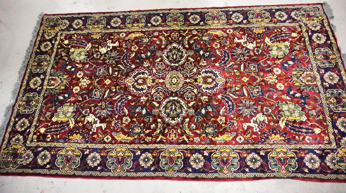MIDDLE EASTERN RUG DECORATED WITH FLOWERS AND ANIMALS. (1 of 4)