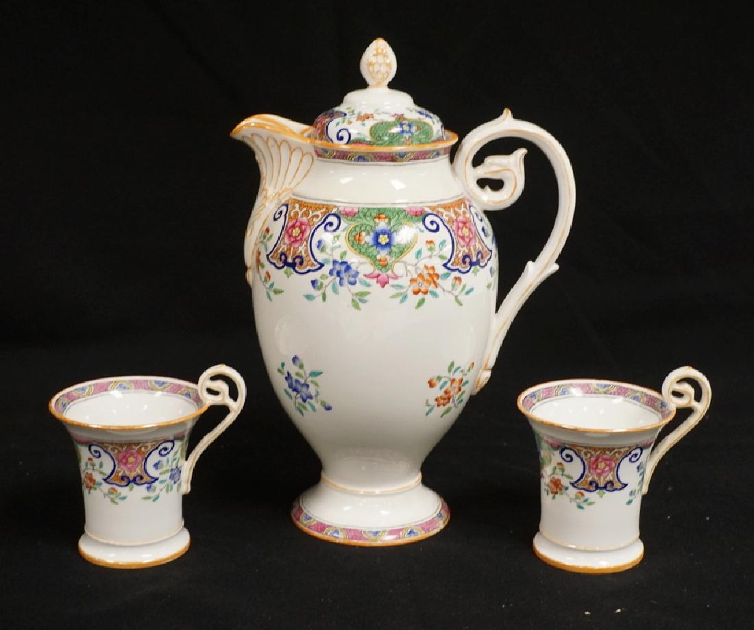 3 PIECES MINTONS PORCELAIN. THE POT HANGIN A CHIP ON: 3 PIECES MINTONS PORCELAIN. THE POT HANGIN A CHIP ON THE FOOT AND THE LID HAVING A CHIPPED OFF NOTCH. 10 1/4 INCHES HIGH.