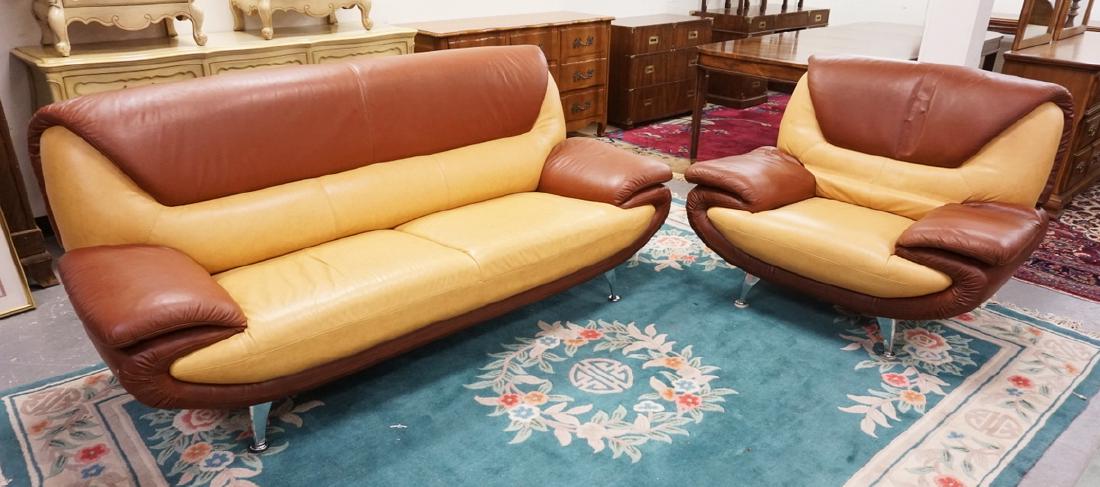 MODERN 2 TONE LEATHER SOFA AND ARM CHAIR WITH CHROME: MODERN 2 TONE LEATHER SOFA AND ARM CHAIR WITH CHROME LEGS. SOFA HAS A COUPLE MINOR NICKS IN THE LEATHER. SOFA IS 80 IN WIDE