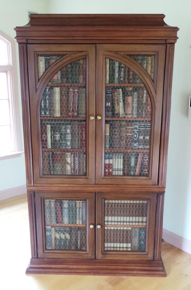 TWO-PIECE ENTERTAINMENT CABINET DECORATED WITH PHONE (1 of 3)