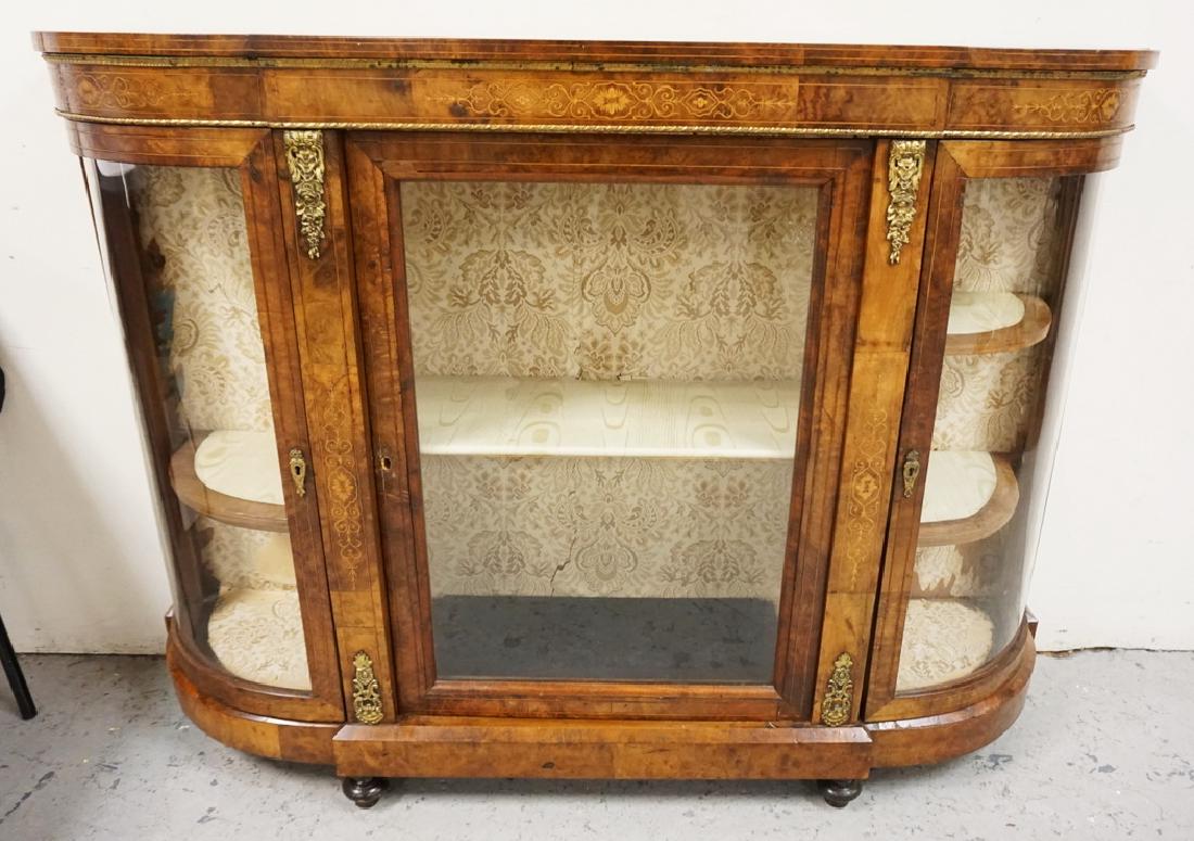 BURLED CREDENZA DECORATED WITH INLAY AND BRASS MOUNTS.: BURLED CREDENZA DECORATED WITH INLAY AND BRASS MOUNTS. CURVED SIDES. 59 INCHES WIDE. 42 INCHES HIGH.