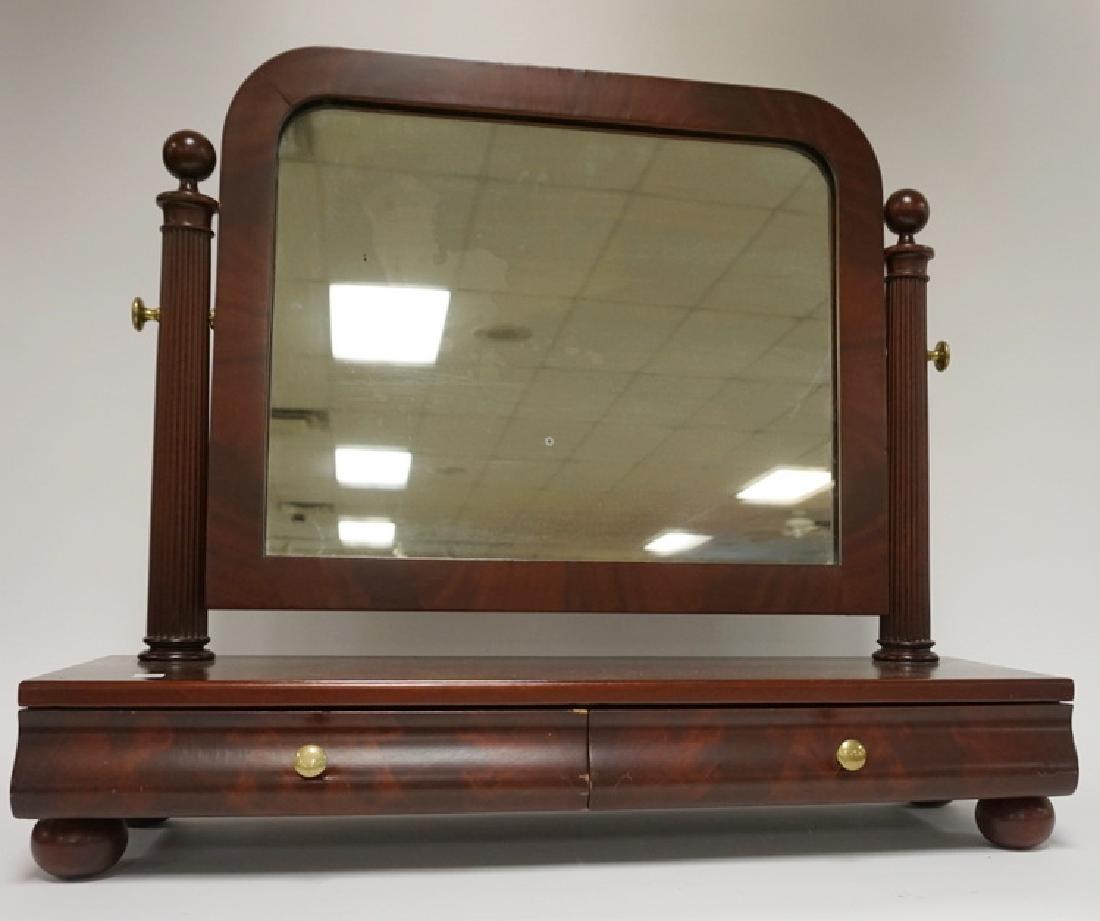 MAHOGANY 2 DRW SHAVING MIRROR WITH FLUTED POSTS AND BUN: MAHOGANY 2 DRW SHAVING MIRROR WITH FLUTED POSTS AND BUN FEET. 30 IN WIDE, 25 1/2 IN H