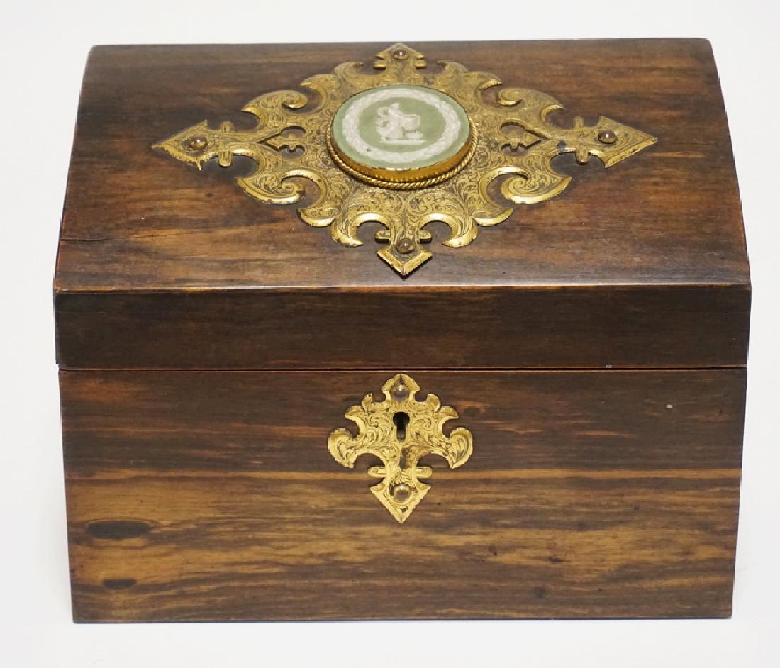 ANTIQUR LETTER BOX WITH ORNATELY TOOLED BRASS ACEENTS: ANTIQUR LETTER BOX WITH ORNATELY TOOLED BRASS ACEENTS WITH A WEDGWOOD JASPERWARE MEDALLION. DIVIDED INTERIOR. 9 1/2 INCHES WIDE. 7 1/4 INCHES HIGH.