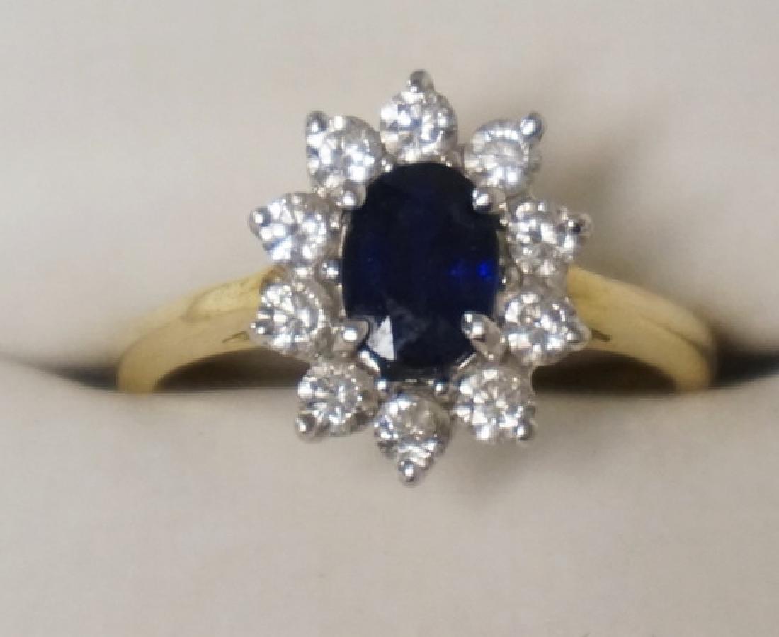 14K GOLD SAPPHIRE RING WITH A HALO OF 10 ROUND DIAMOND (1 of 1)