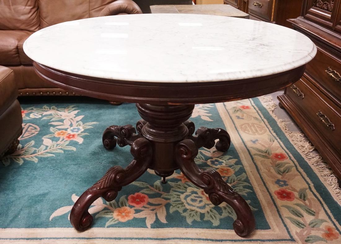 ROUND MARBLE TOP TABLE WITH A CARVED BASE. 42 INCH DIA. (1 of 2)