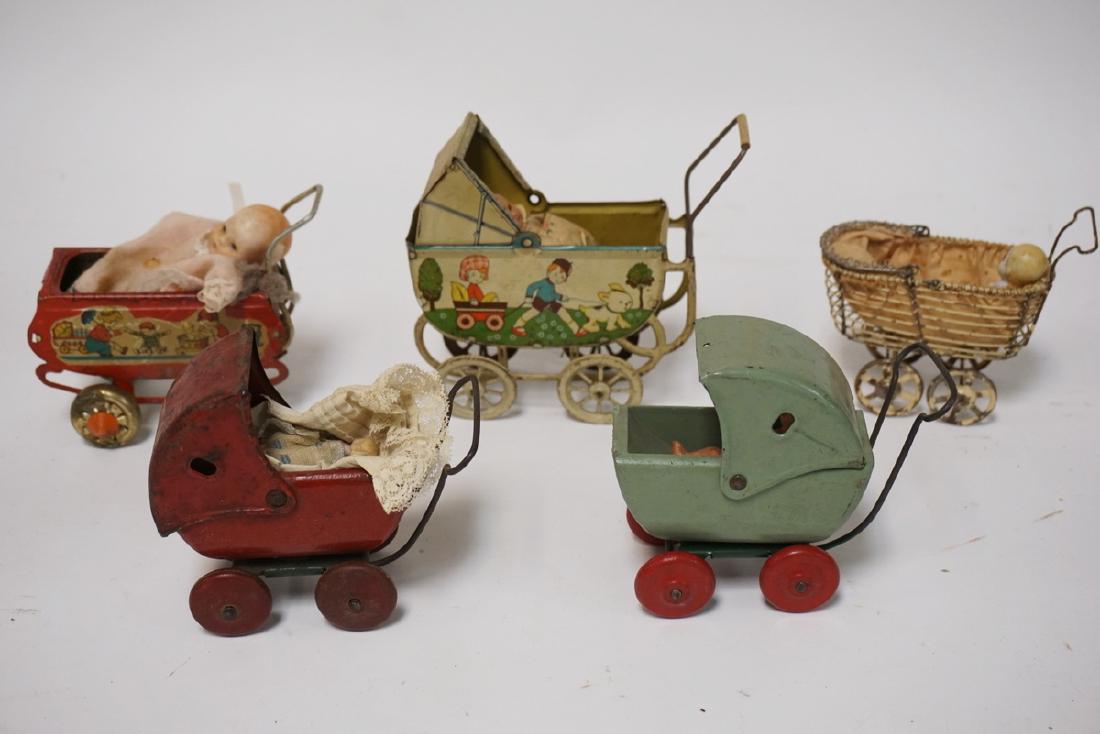 LOT OF 5 VINTAGE TOY DOLL CARRIAGES WITH DOLLS. LARGEST (1 of 2)