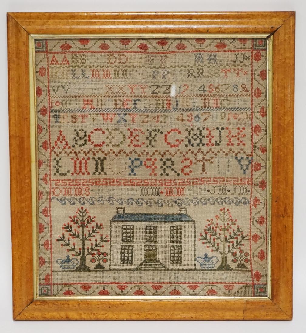 SAMPLER: 19TH CENTURY ALPHABET SAMPLER FEATURING A HOUSE AND TREES. 18 1/4 X 20 INCH BIRDSEYE MAPLE FRAME.