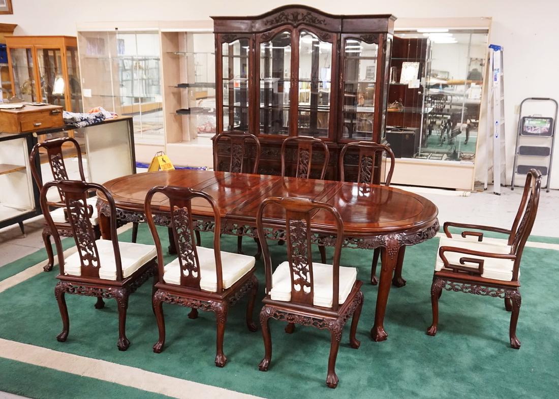 10 PIECE CARVED ASIAN HARDWOOD DINING ROOM SET: 10 PIECE CARVED ASIAN HARDWOOD DINING ROOM SET CONSISTING OF A BREAKFRONT, TABLE WITH 2 LEAVES, AND 8 CHAIRS.