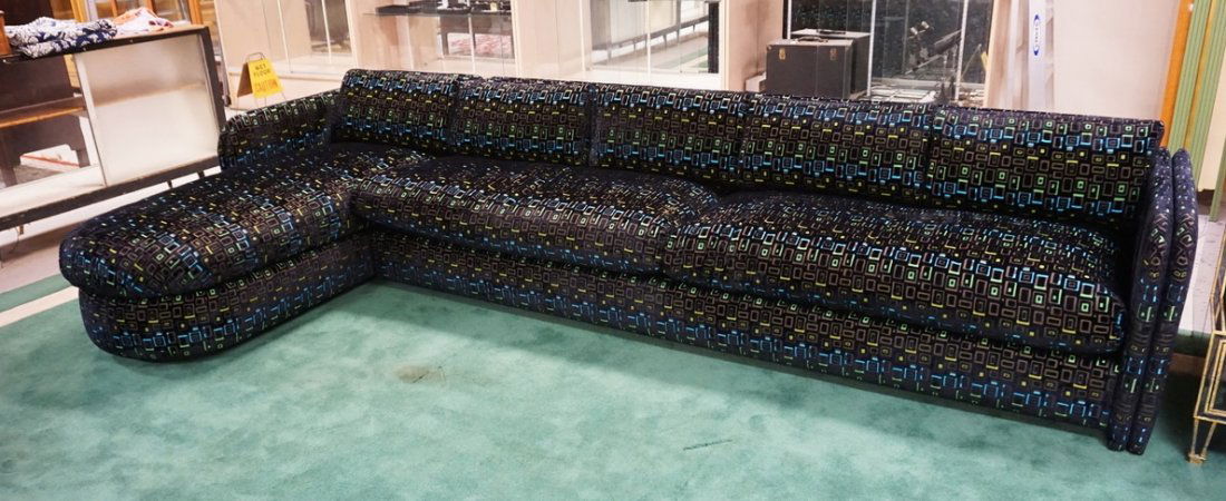 DESIGNER GUILD MODERN SECTIONAL SOFA IN BLACK WITH A: DESIGNER GUILD MODERN SECTIONAL SOFA IN BLACK WITH A NEON GREEN & BLUE GEOMETRIC PATTERN.