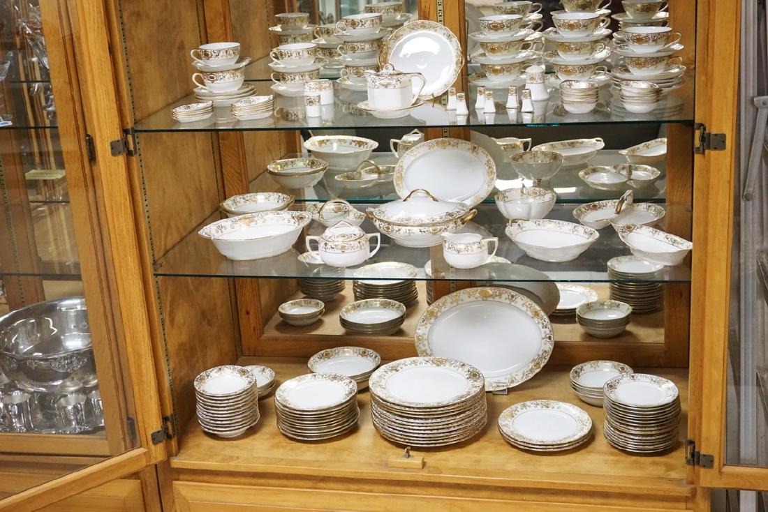 NORITAKE: 147 PIECE ASSEMBLED SET OF NORITAKE #10634/175 (CHRISTMAS BALL) DINNERWARE. LARGEST PLATTER MEASURES 13 5/8 INCHES.