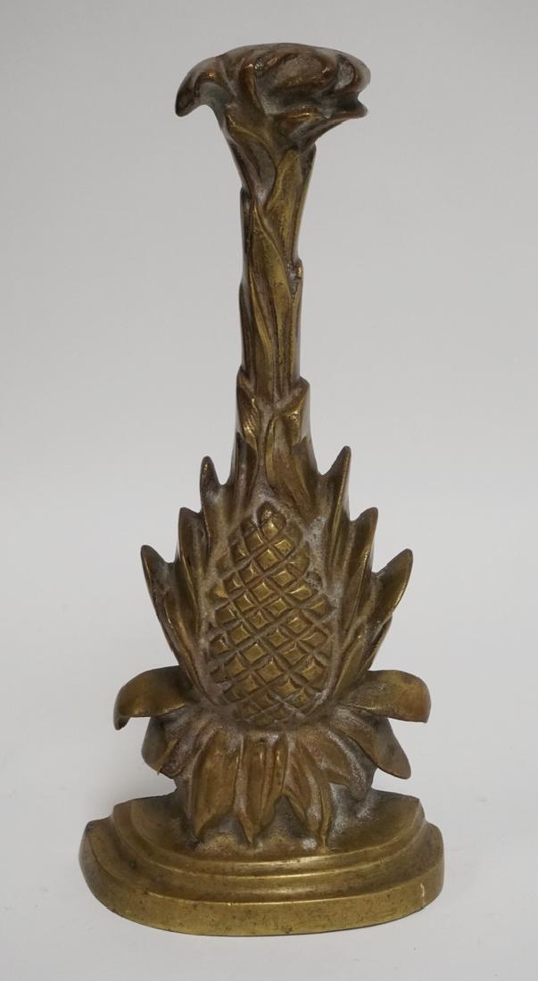 DOORSTOP: ANTIQUE BRONZE DOORSTOP. 13 1/4 INCHES HIGH.