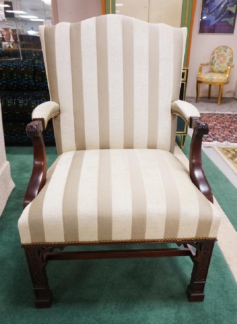 STICKLEY CARVED ARMCHAIR WITH STRIPED UPHOLSTERY. 29: STICKLEY CARVED ARMCHAIR WITH STRIPED UPHOLSTERY. 29 INCHES WIDE. 43 INCHES HIGH.