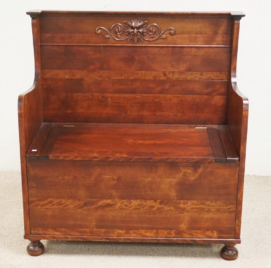 LIFT TOP BENCH: LIFT TOP BENCH. HIGH BACK WITH A CARVED NORTHWIND. BUN FEET. 37 INCHES HIGH. 47 1/2 INCHES WIDE.