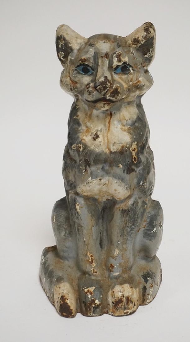CAT DOORSTOP: ANTIQUE CAST IRON CAT DOORSTOP. 9 INCHES HIGH.