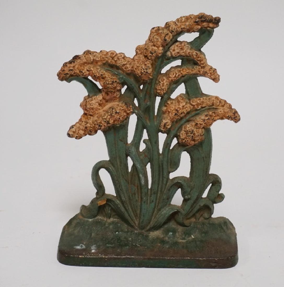 DOORSTOP: 1940'S JOHN WRIGHT (FROM A HUBLEY MOLD) CAST IRON GOLDENROD DOORSTOP #268. 7 1/8 INCHES HIGH.