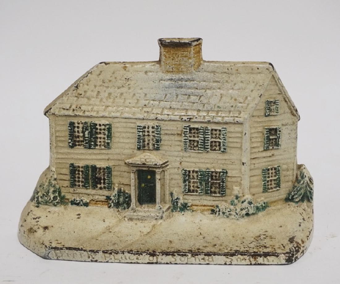 IRON DOORSTOP: CAST IRON DOORSTOP *BIRTHPLACE OF SOPHIA SMITH*. 5 1/2 INCHES HIGH.