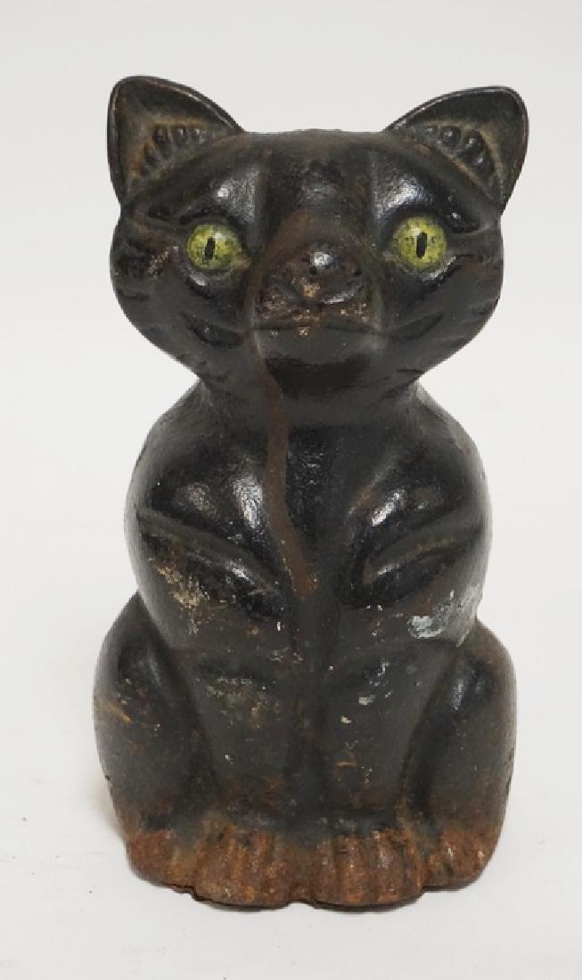 CAT DOORSTOP: CAST IRON CAT DOORSTOP. 7 INCHES HIGH.