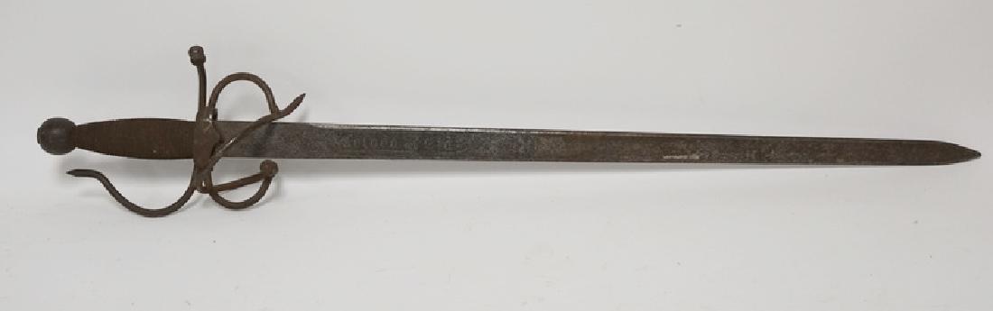 SPANISH SWORD WITH A WROUGHT IRON HANDLE AND AN: SPANISH SWORD WITH A WROUGHT IRON HANDLE AND AN ENGRAVED BLADE READING *COLADA DEL CID*