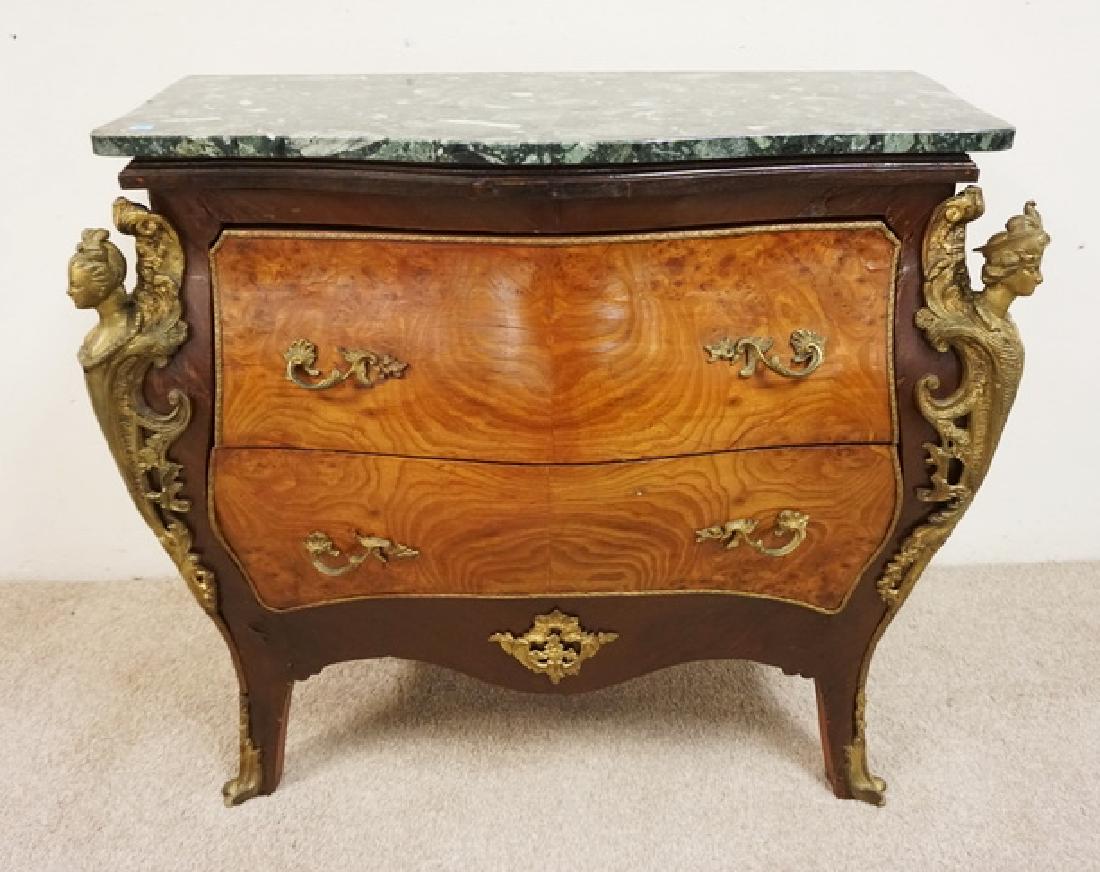 INLAID AND BRONZE MOUNTED COMMODE.: INLAID AND BRONZE MOUNTED 2 DRAWER COMMODE. LARGE BRONZE MOUNTS IN THE FORM OF THE BUST OF A WOMAN. MARBLE TOP. 36 INCHES WIDE. 33 1/2 INCHES WIDE.