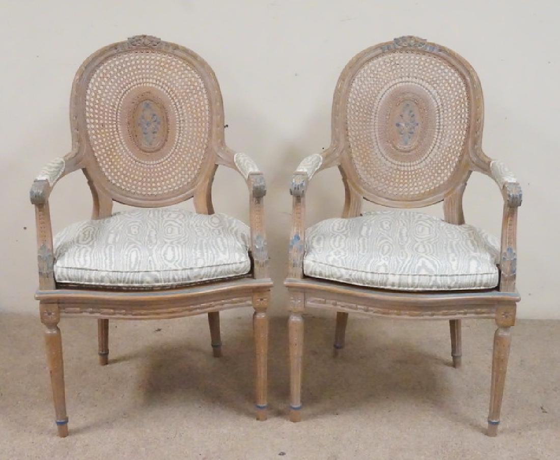 PAIR OF CANED MEDALLION BACK CHAIRS.: PAIR OF CANED MEDALLION BACK CARVED CHAIRS.