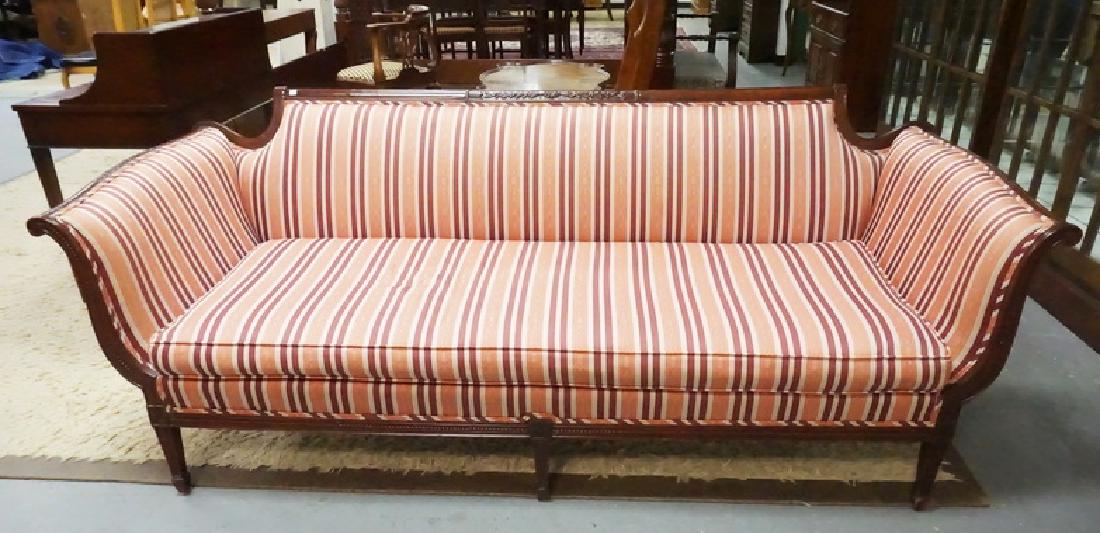 CARVED MAH. SOFA: CARVED MAHOGANY DUNCAN PHYFE STYLE SOFA.WITH STRIPED UPHOLSTERY. 85 IN WIDE