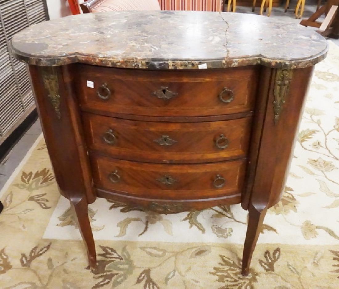 BRONZE MTD COMMODE: BRONZE MOUNTED AND INLAID COMMODE WITH DARK MARBLE TOP. MARBLE IS BROKEN IN 2 PIECES. 36 IN WIDE, 33 3/4 IN H
