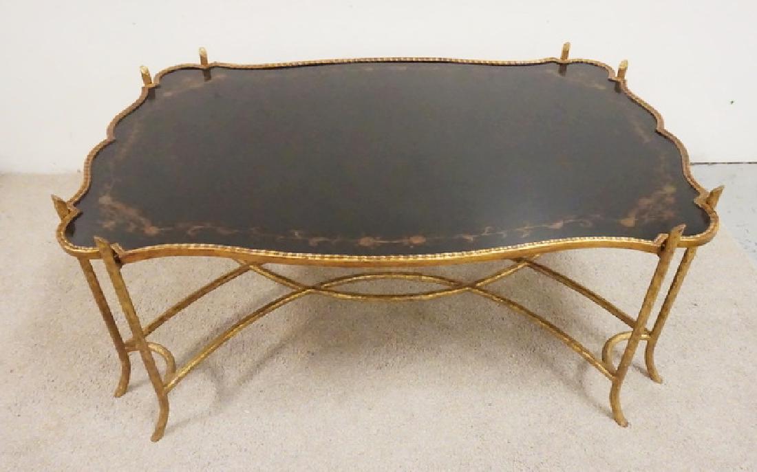 COFFEE TABLE. GOLD GILT AND BLACK LACQUERED.: GOLD GILT AND BLACK LACQUERED COFFEE TABLE. STEEL TWIG FORM BASE. GOLD STENCILLED BLACK LACQUERED TOP. 50 X 33 AND 21 INCHES HIGH.