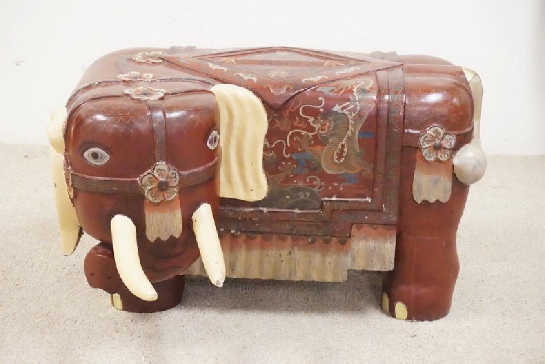 ASIAN ELEPHANT BENCH: LARGE ASIAN LACQUERED ELEPHANT FORM BENCH. 34 X 28 AND 20 INCHES HIGH. HAS SOME LACQUER LOSS.
