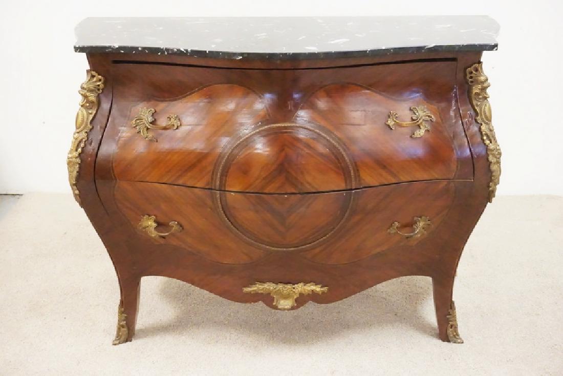 BRONZE MOUNTED BOMBE MARBLE TOP COMMODE.: BRONZE MOUNTED BOMBE COMMODE WITH A MARBLE TOP. 48 INCHES WIDE. 35 INHCES HIGH. VENEER LOSSES TO A BACK LEG.
