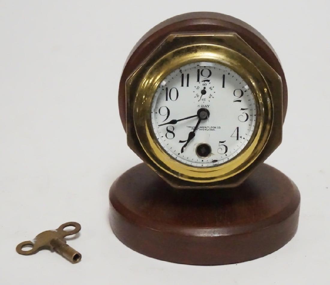 NEW HAVEN CANAL BOAT CLOCK: NEW HAVEN CANAL BOAT CLOCK. 6 INCHES HIGH, PORCELAIN ENAMEL FACE HAS SMALL NICKS.