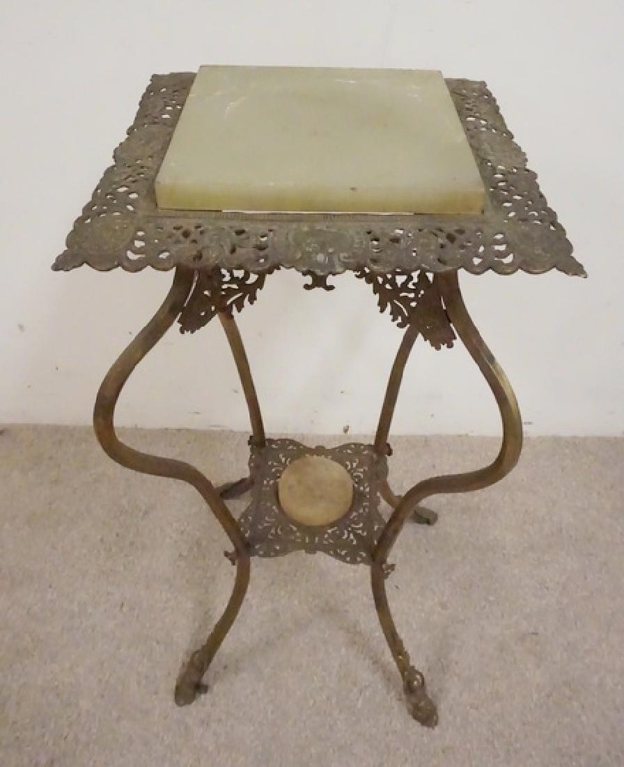 VICTORIAN BRASS STAND WITH AN ONYX TOP.: VICTORIAN BRASS STAND WITH AN ONYX TOP. 31 INCHES HIGH. 15 INCHES SQAURE.